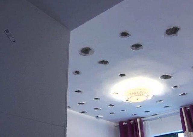 天花板现66个洞 楼上装修工人以及物业却给予了两个说法